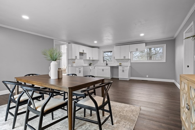 dining room with crown molding, baseboards, recessed lighting, and dark wood-style flooring