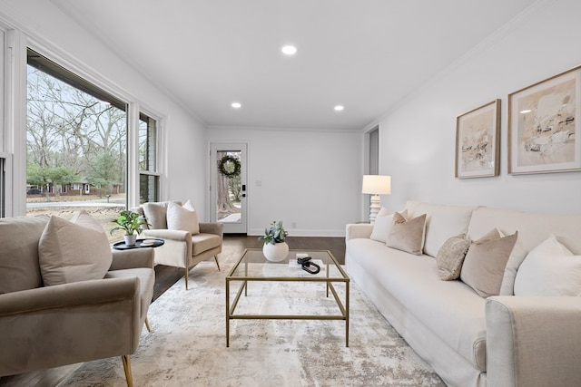 living area featuring ornamental molding, recessed lighting, wood finished floors, and baseboards