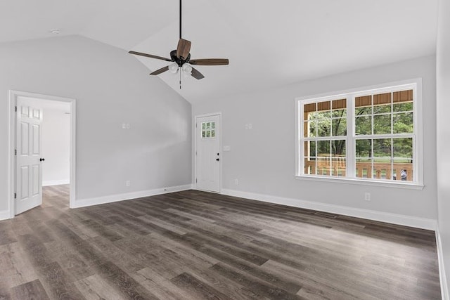 unfurnished living room with ceiling fan, dark hardwood / wood-style flooring, and high vaulted ceiling