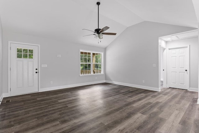 unfurnished living room featuring lofted ceiling, dark wood-type flooring, and ceiling fan