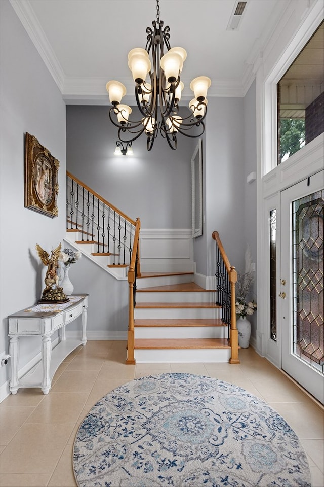 604 Lenna Ln, Dalton, GA 30720 - tiled foyer with a chandelier, ornamental molding, stairs, and baseboards