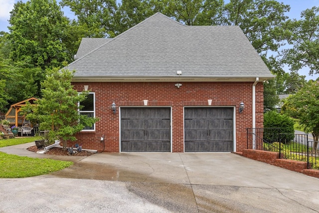 604 Lenna Ln, Dalton, GA 30720 - view of side of property with roof with shingles, driveway, and brick siding