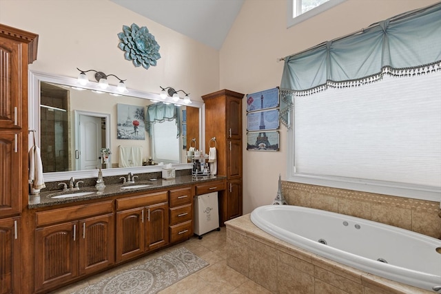 604 Lenna Ln, Dalton, GA 30720 - full bath featuring a tub with jets, a stall shower, double vanity, high vaulted ceiling, and tile patterned floors