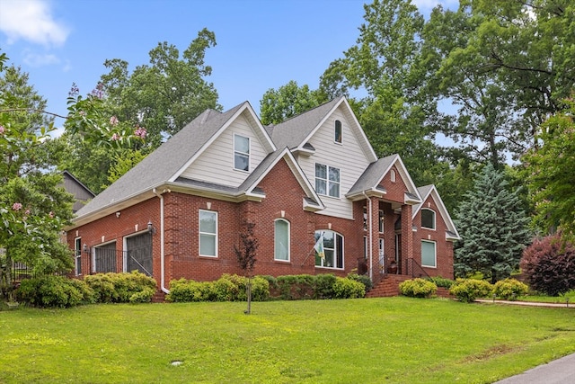 604 Lenna Ln, Dalton, GA 30720 - traditional home with brick siding, a front yard, an attached garage, and a shingled roof