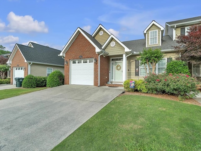 1501 Augusta Dr Unit 1, Dalton, GA 30721 - view of front of house with concrete driveway, a garage, a front yard, and brick siding
