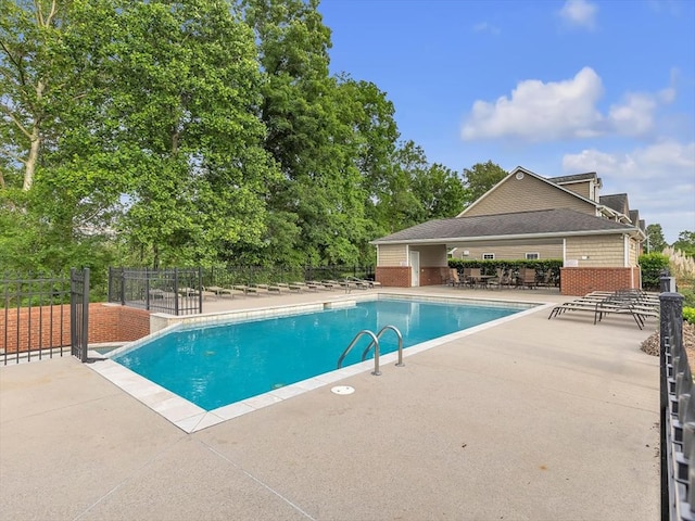 1501 Augusta Dr Unit 1, Dalton, GA 30721 - community pool featuring a patio, fence, and view of wooded area