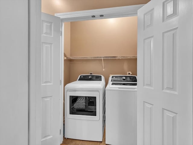 1501 Augusta Dr Unit 1, Dalton, GA 30721 - laundry area with washing machine and clothes dryer and light tile patterned floors