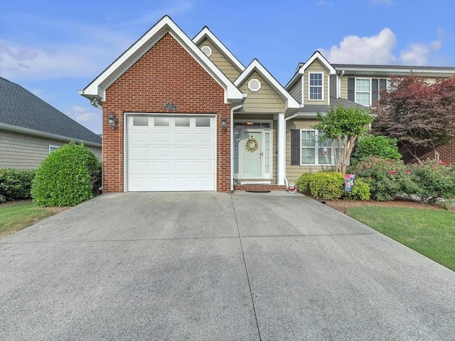1501 Augusta Dr Unit 1, Dalton, GA 30721 - view of front of house featuring concrete driveway, a garage, and brick siding