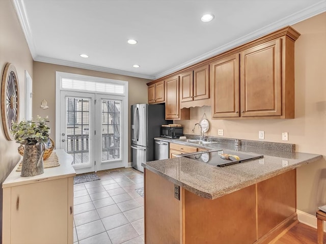 1501 Augusta Dr Unit 1, Dalton, GA 30721 - kitchen with a sink, black appliances, crown molding, a peninsula, and a kitchen breakfast bar