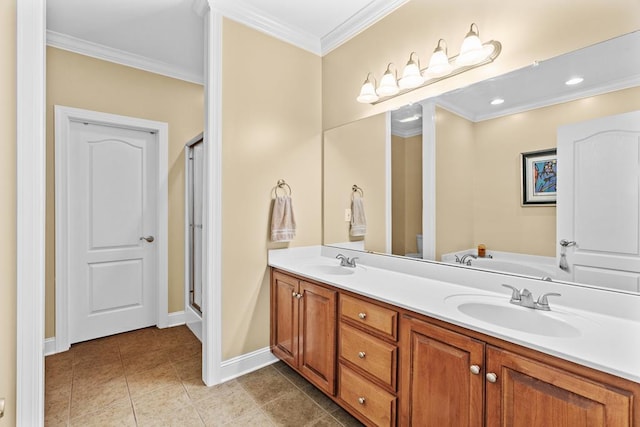 bathroom featuring crown molding, vanity, a shower with shower door, and tile patterned flooring