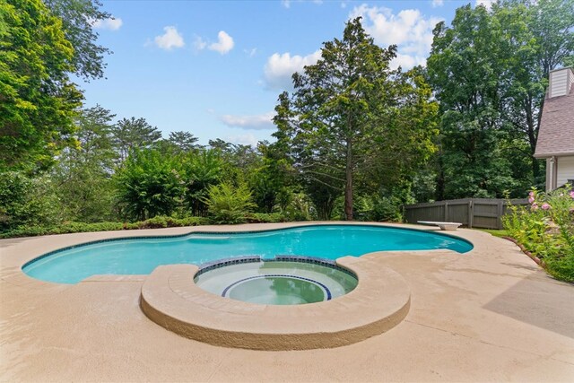 2219 Rocky Face Cir, Dalton, GA 30740 - view of pool featuring a pool with connected hot tub and view of scattered trees