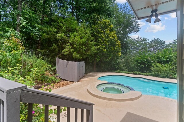 2219 Rocky Face Cir, Dalton, GA 30740 - view of swimming pool with a pool with connected hot tub and a patio area