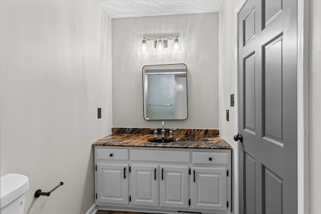 2219 Rocky Face Cir, Dalton, GA 30740 - bathroom featuring vanity and a textured ceiling