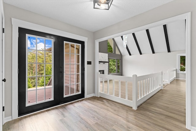 2219 Rocky Face Cir, Dalton, GA 30740 - doorway to outside with light wood-type flooring, french doors, and lofted ceiling