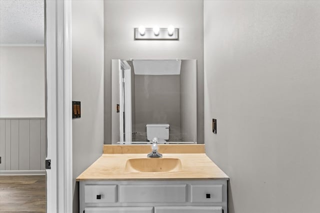 2219 Rocky Face Cir, Dalton, GA 30740 - bathroom featuring vanity, wood finished floors, and a textured ceiling