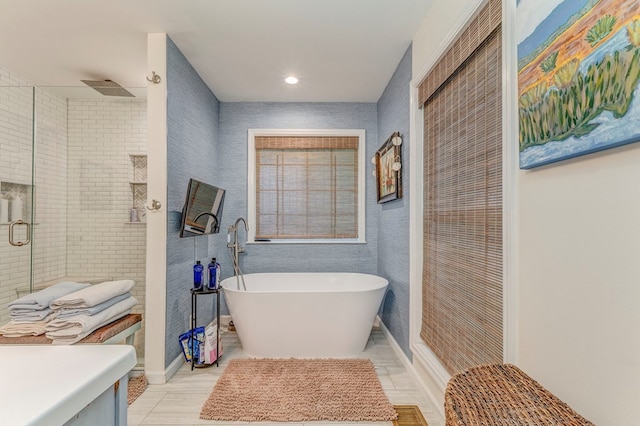 201 Tibbs Rd, Dalton, GA 30720 - bathroom featuring a stall shower, a freestanding tub, and recessed lighting