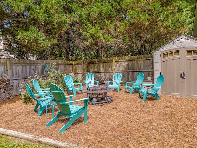 201 Tibbs Rd, Dalton, GA 30720 - fenced backyard with a fire pit