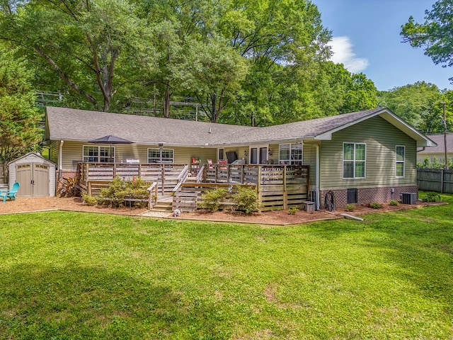 201 Tibbs Rd, Dalton, GA 30720 - back of property with a wooden deck, roof with shingles, and central AC unit