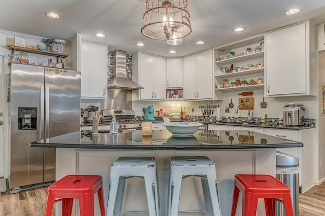 201 Tibbs Rd, Dalton, GA 30720 - kitchen with open shelves, wall chimney exhaust hood, appliances with stainless steel finishes, light wood-style floors, and recessed lighting