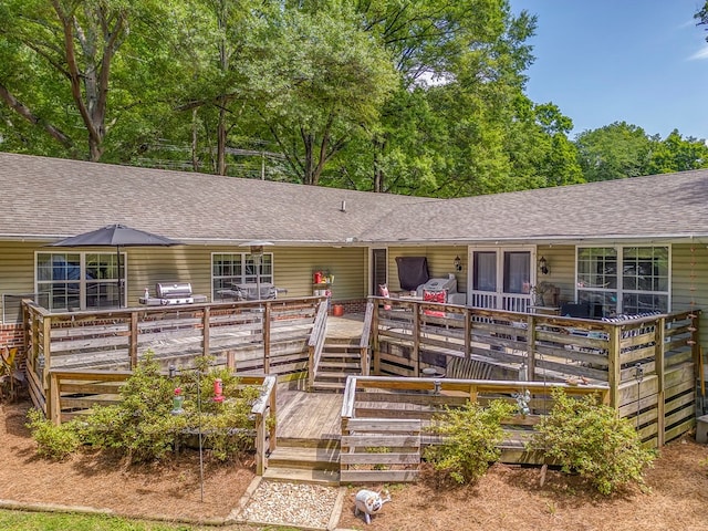 201 Tibbs Rd, Dalton, GA 30720 - ranch-style house featuring a shingled roof and a wooden deck