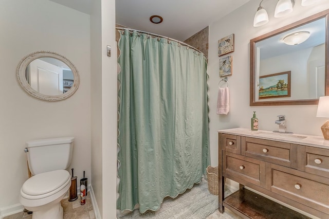 201 Tibbs Rd, Dalton, GA 30720 - bathroom featuring toilet, vanity, a shower with curtain, and baseboards