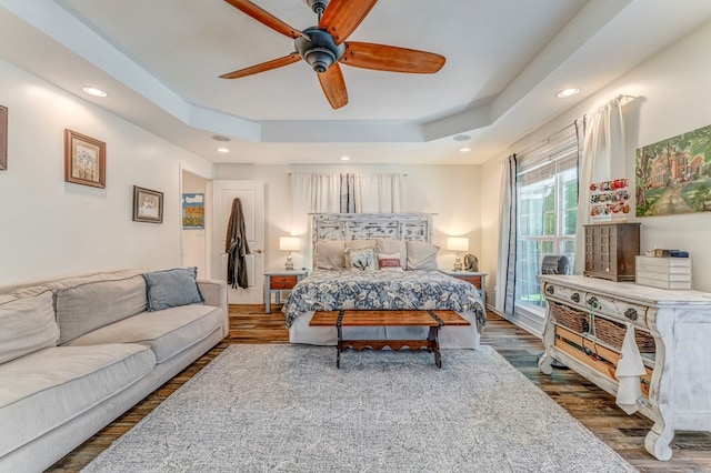 201 Tibbs Rd, Dalton, GA 30720 - bedroom featuring a tray ceiling, recessed lighting, ceiling fan, and wood finished floors