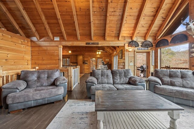 interior space featuring beamed ceiling, wood ceiling, wooden walls, and wood-type flooring