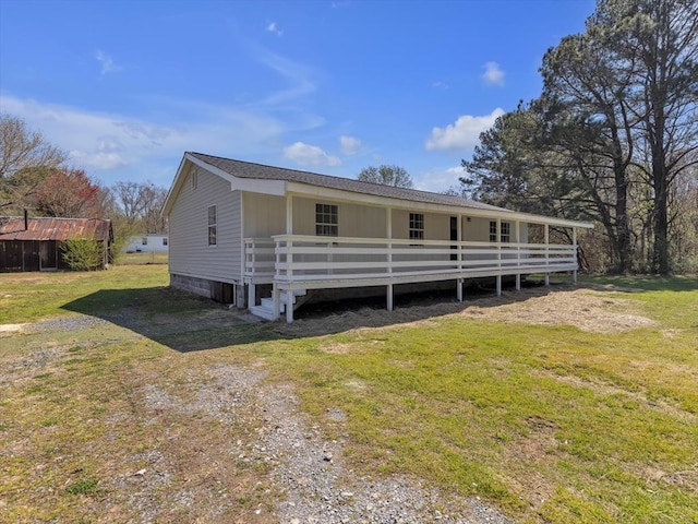 104 Riverview Dr, Dalton, GA 30721 - view of front of house featuring a front yard and a wooden deck