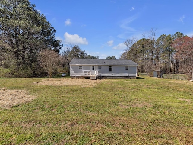 104 Riverview Dr, Dalton, GA 30721 - rear view of house with a lawn