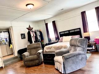 bedroom featuring wood-type flooring