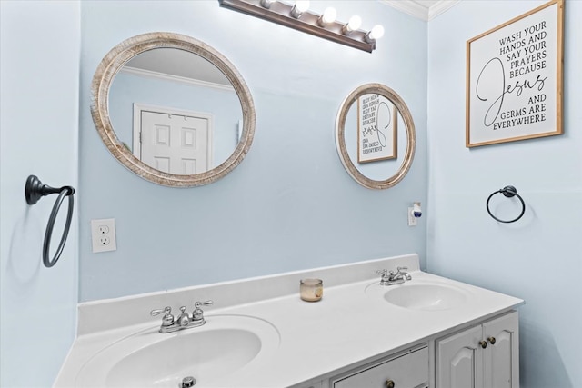 bathroom featuring ornamental molding and vanity