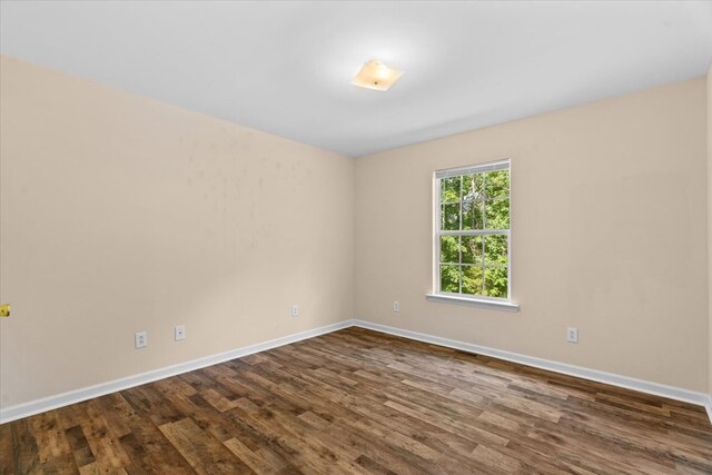 120 Loudermilk Rd, Chatsworth, GA 30721 - unfurnished room featuring dark wood-style floors and baseboards