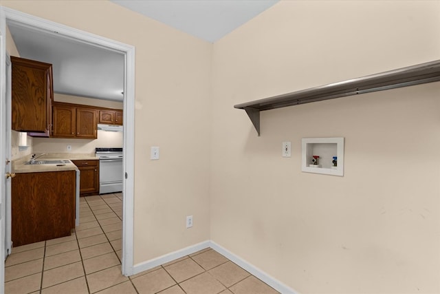 120 Loudermilk Rd, Chatsworth, GA 30721 - washroom with washer hookup and light tile patterned floors