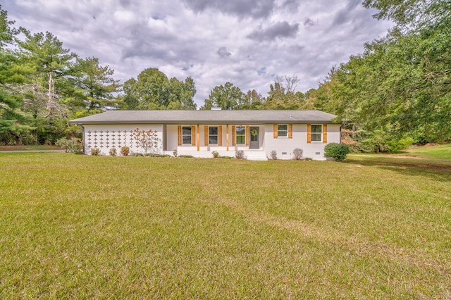 ranch-style home with a front yard