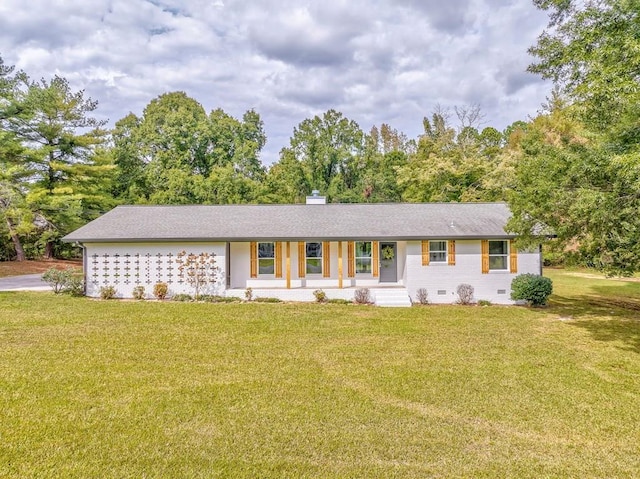 ranch-style home with a porch and a front yard