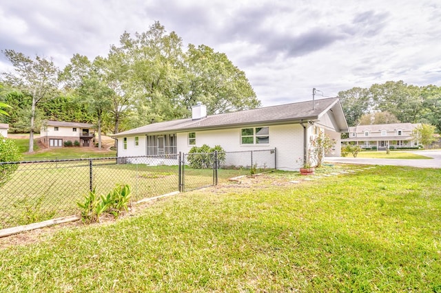 exterior space with a front lawn