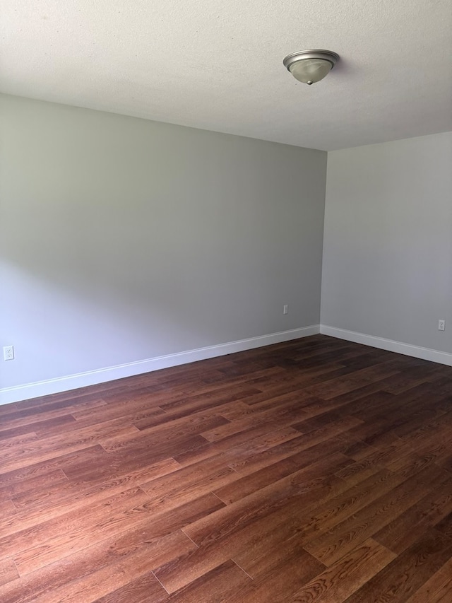 2305 Epperson Dr, Dalton, GA 30721 - spare room with dark wood-type flooring and baseboards