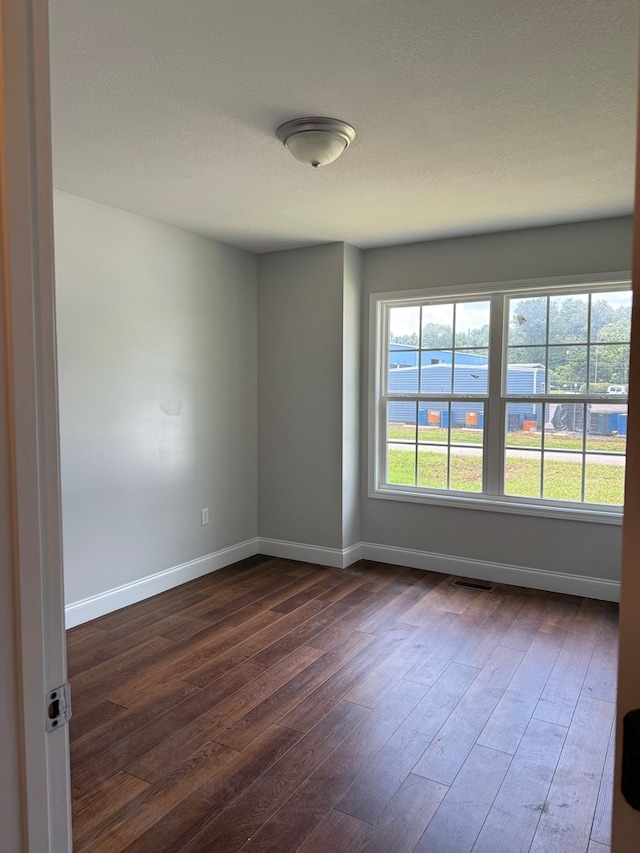 2305 Epperson Dr, Dalton, GA 30721 - unfurnished room featuring dark wood finished floors