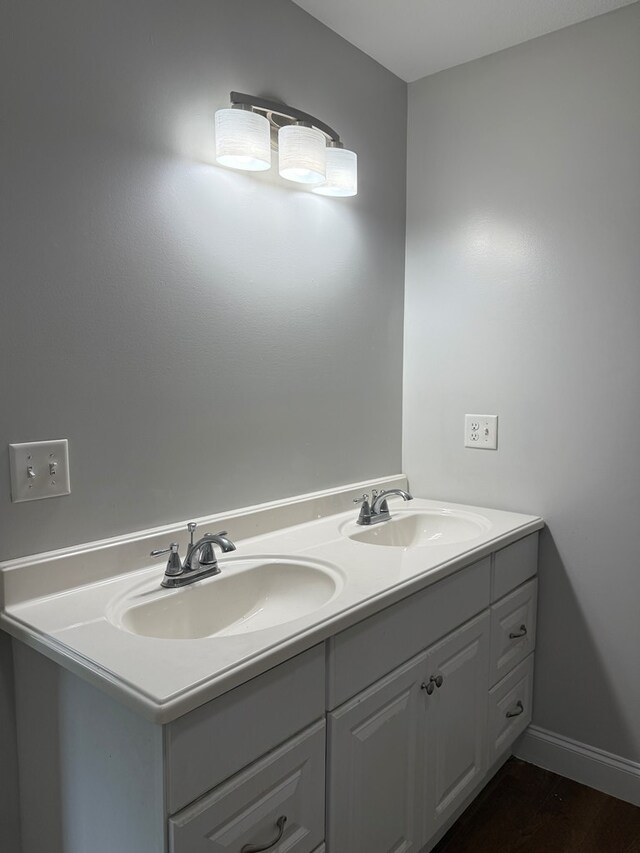 2305 Epperson Dr, Dalton, GA 30721 - bathroom with double vanity and wood finished floors
