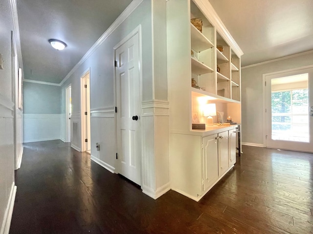 1229 Valencia Dr, Dalton, GA 30720 - hallway with crown molding, dark wood finished floors, and wainscoting