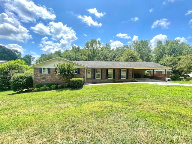 1229 Valencia Dr, Dalton, GA 30720 - ranch-style house featuring a carport, brick siding, a front yard, and driveway
