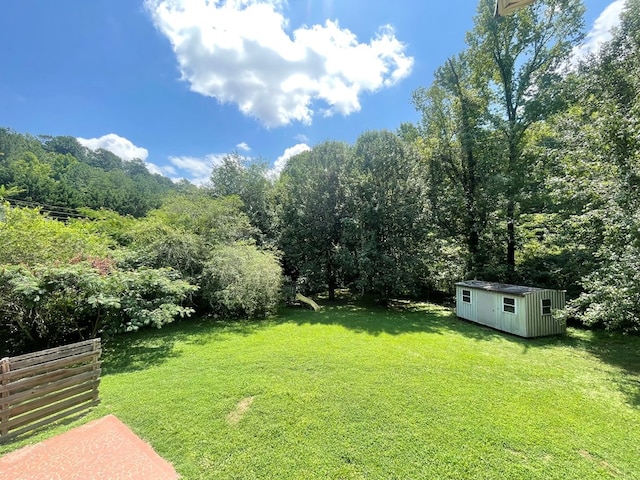 1229 Valencia Dr, Dalton, GA 30720 - view of yard featuring a storage unit