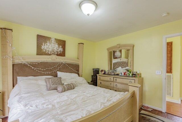 128 Andasol Way, Dalton, GA 30720 - bedroom with baseboards, visible vents, and wood finished floors
