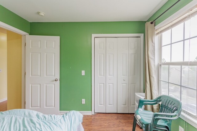 128 Andasol Way, Dalton, GA 30720 - bedroom with baseboards, a closet, and wood finished floors