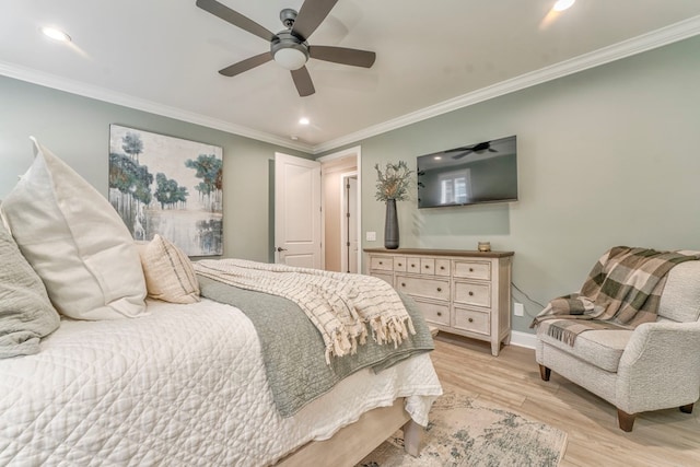 bedroom featuring ornamental molding, light hardwood / wood-style floors, and ceiling fan