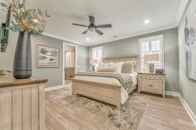 bedroom featuring multiple windows, ornamental molding, ceiling fan, and light hardwood / wood-style flooring