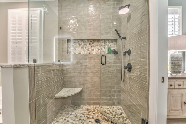 bathroom featuring an enclosed shower