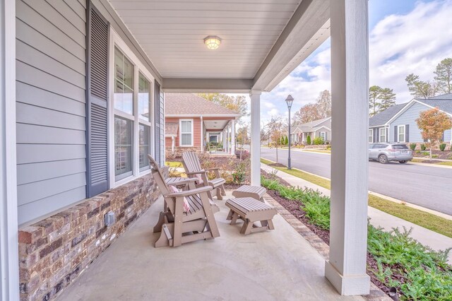 view of front facade with french doors and a front yard