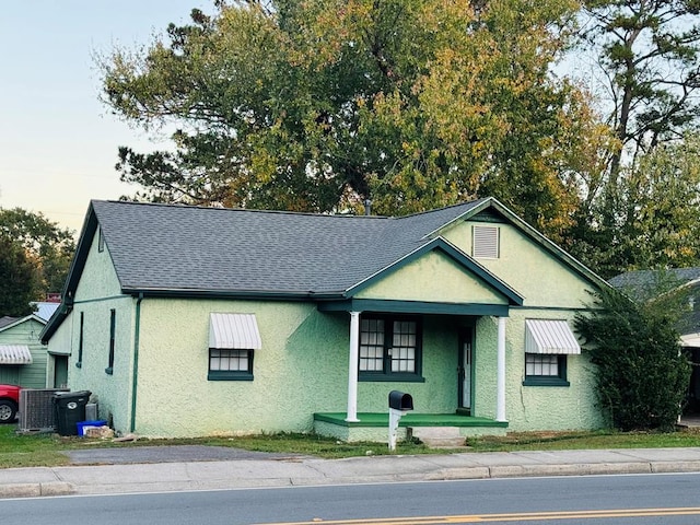 view of front of home with cooling unit