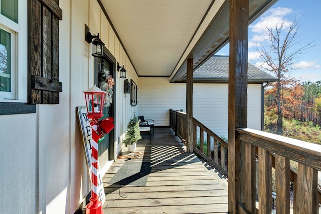 balcony featuring a porch